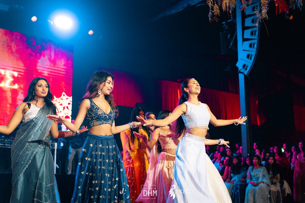 Guests in blue lehengas at the Ball