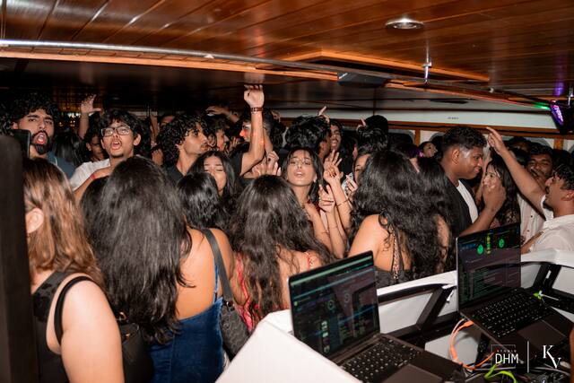 A packed deck at the MUIC boat party