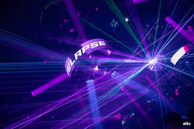 A glowing sphere installation above the dance floor