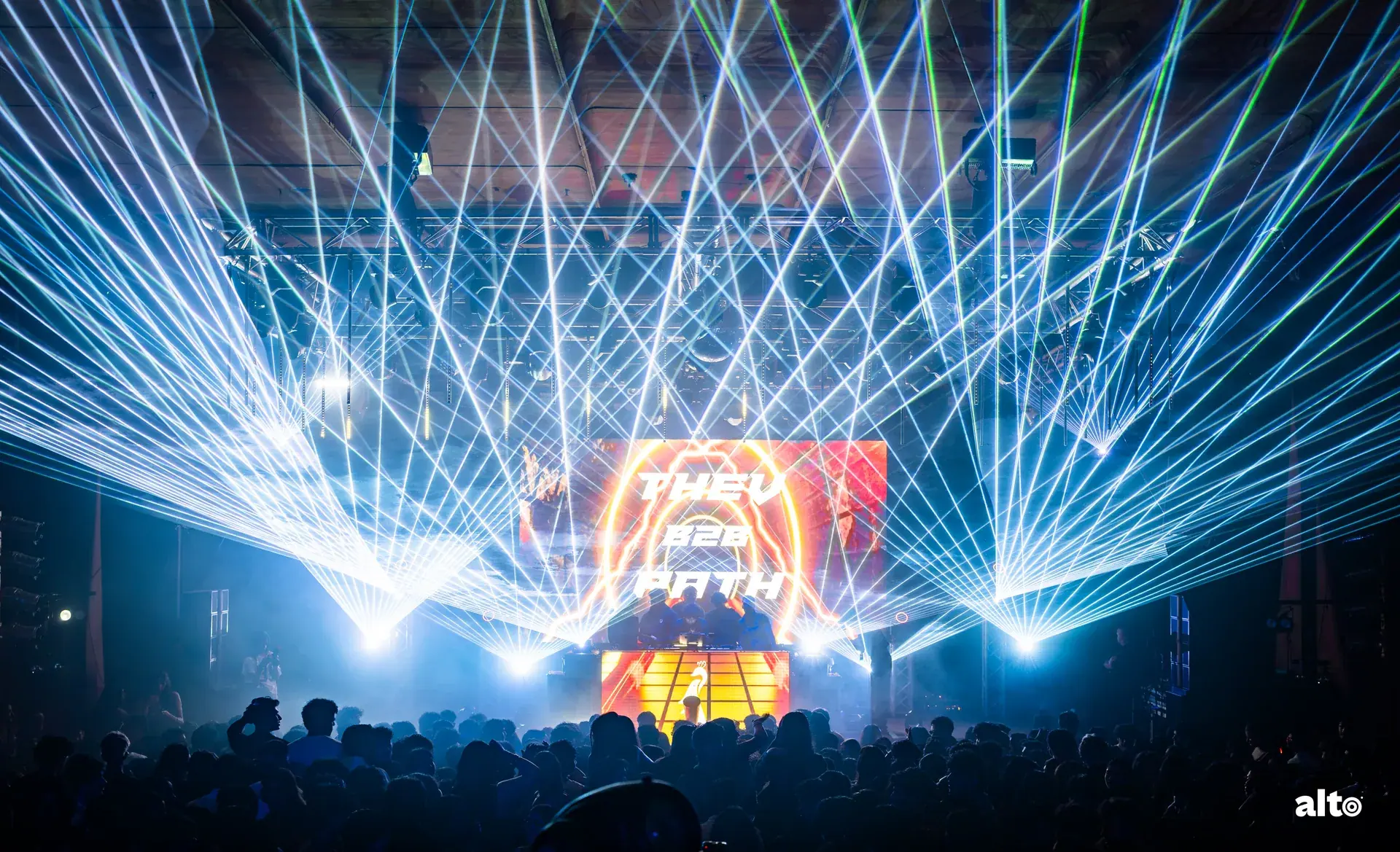 Blue lasers above the Rehab stage and crowd