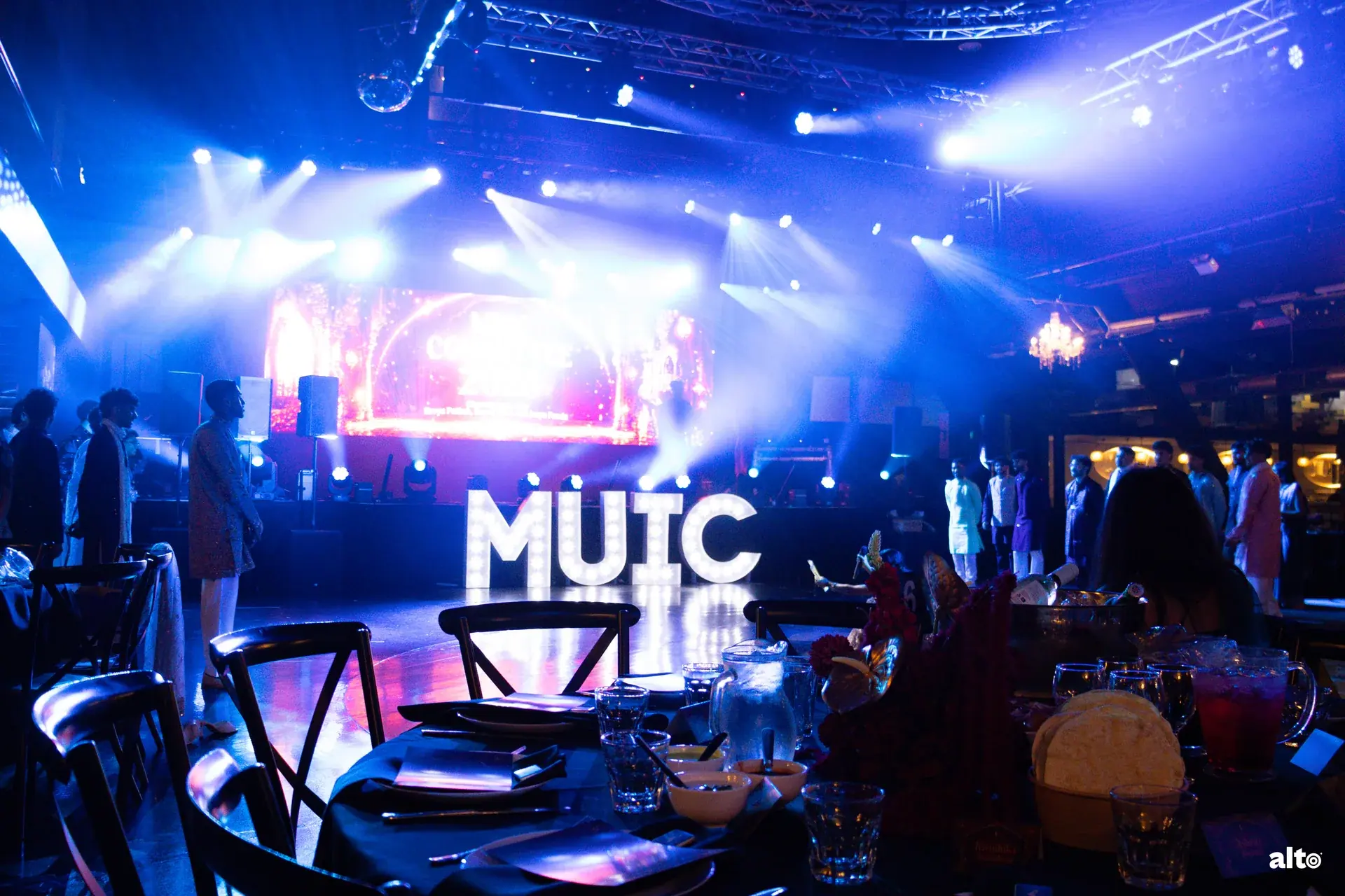 The illuminated MUIC stage at the Royal Peacock Ball